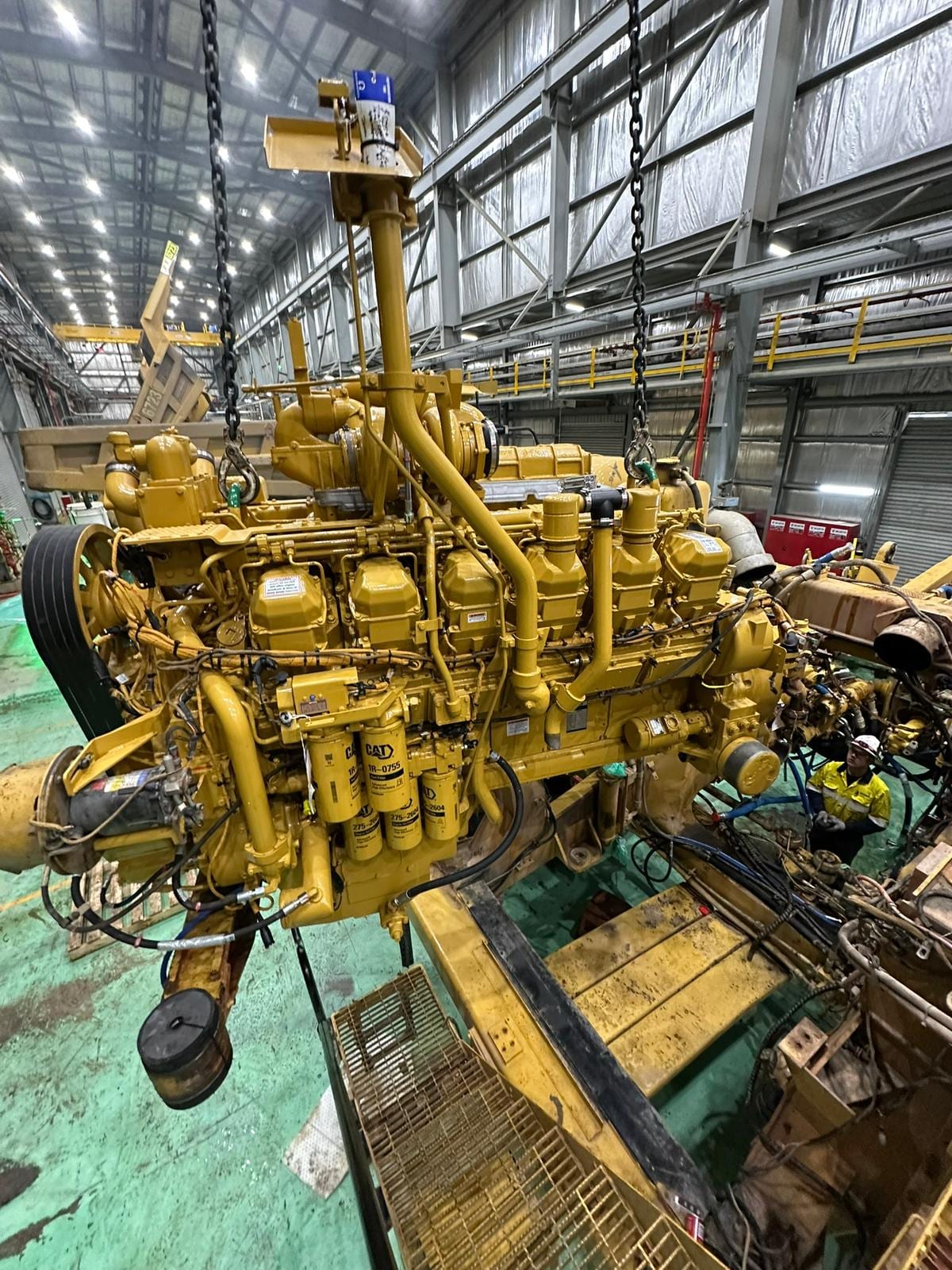 Rebuilt Caterpillar engine on a stand in the Walton Mechanical Bunbury workshop