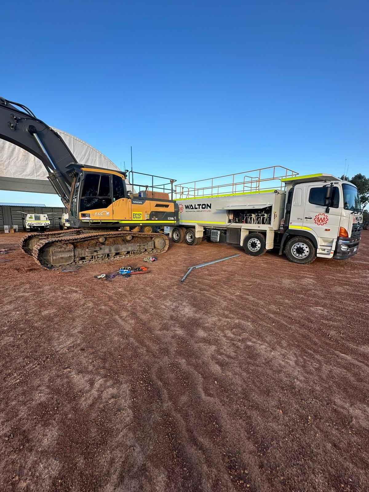 Walton Mechanical service truck supporting an excavator on site